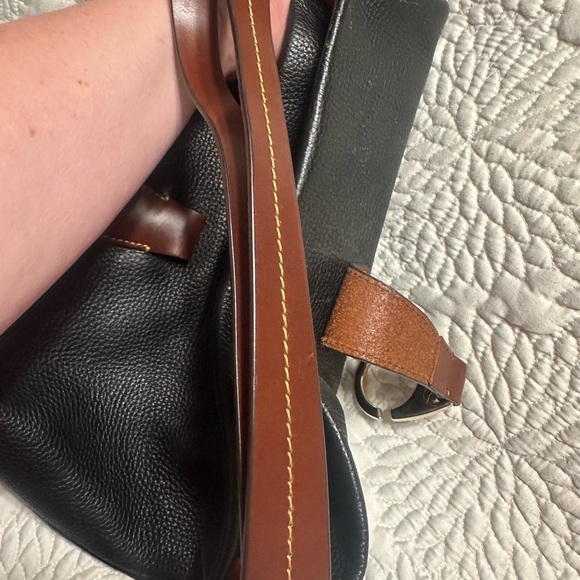 Dooney & Bourke black & brown leather shoulder bag with gold “C” ring/clasp. - Picture 9 of 13